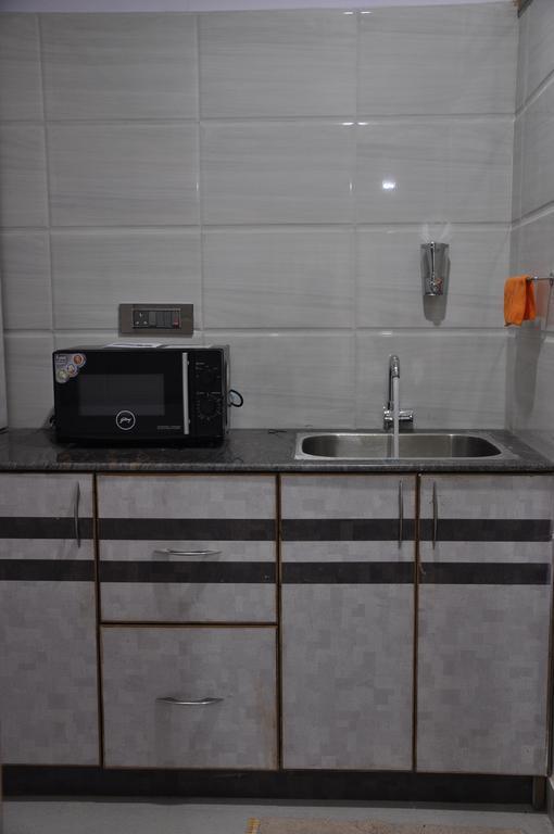 Hotel Av Comforts Settahalasūr 部屋 写真